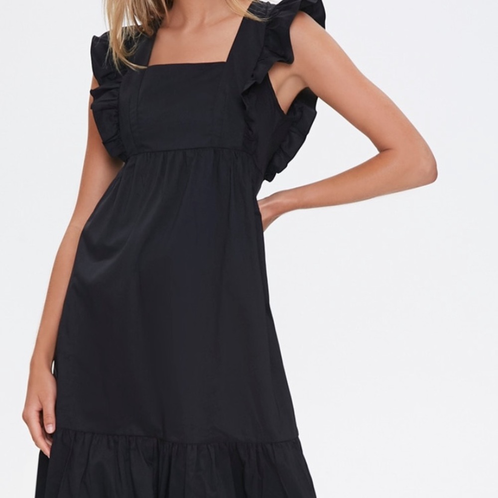 Woven black knee length dress. Never worn.